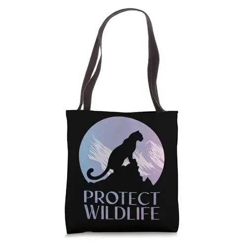 Silhouette of a Leopard on Snowy Mountain Peaks Tote Bag