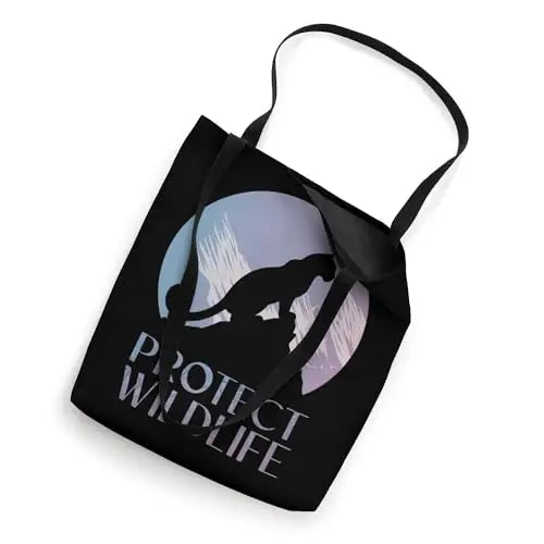 Silhouette of a Leopard on Snowy Mountain Peaks Tote Bag