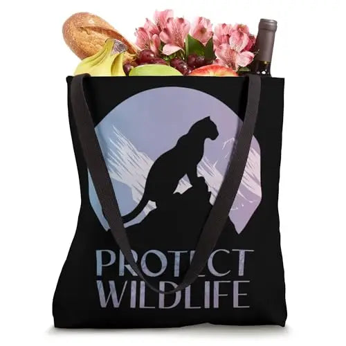 Silhouette of a Leopard on Snowy Mountain Peaks Tote Bag